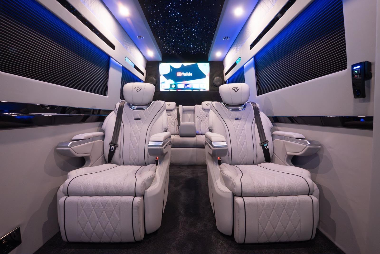 Front-facing view of the Sprinter leather passenger seats